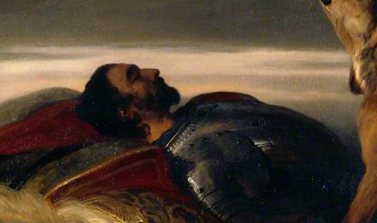 The dead knight in armour on a red cloak