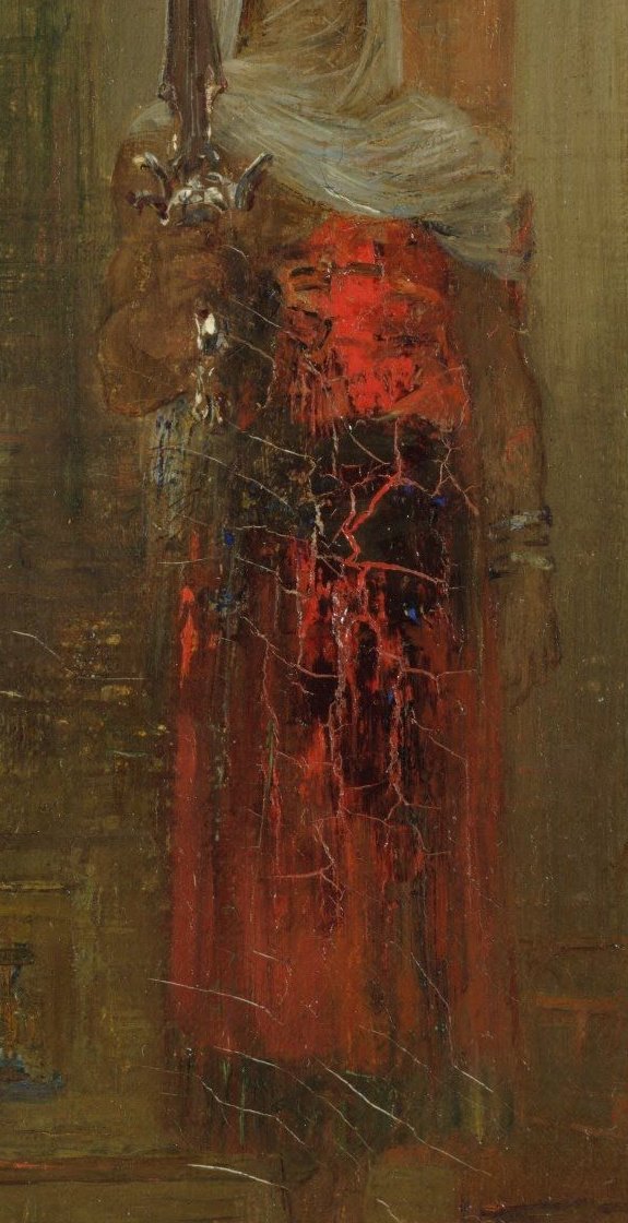 The executioner in a white head cloth and red robe standing on the right, holding a tall sword