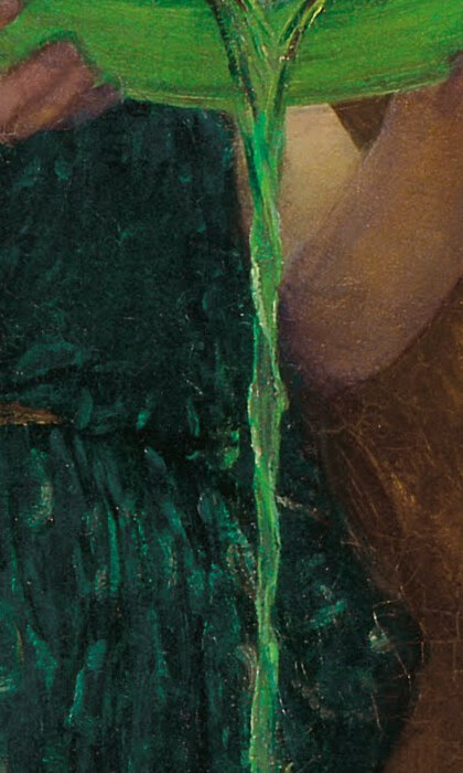 A thin stream of green poison pouring from the lip of the bowl