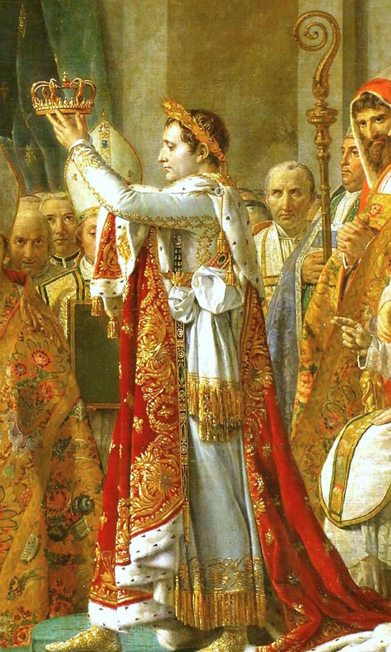 Napoleon in gold and ermine holding the crown above his head with both hands, about to crown Josephine