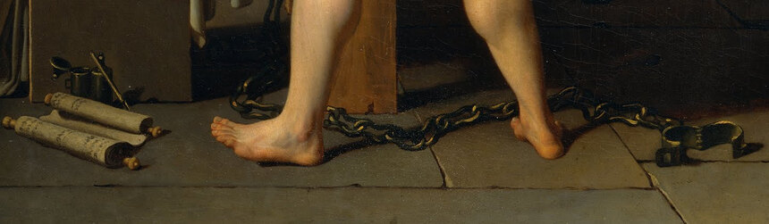 An unlocked shackle and a scroll lying on the prison floor at the foot of the bed