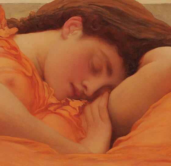 The sleeping woman's face resting on her arm, lips parted, hair loose