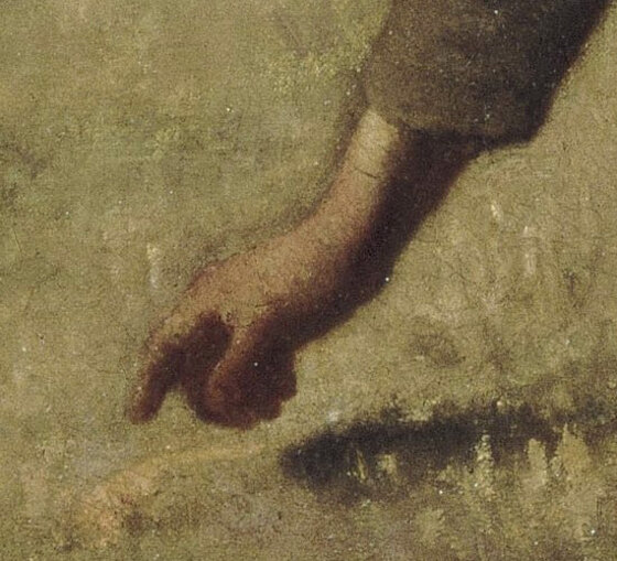 A gleaner's hand reaching for a few ears of wheat in the stubble
