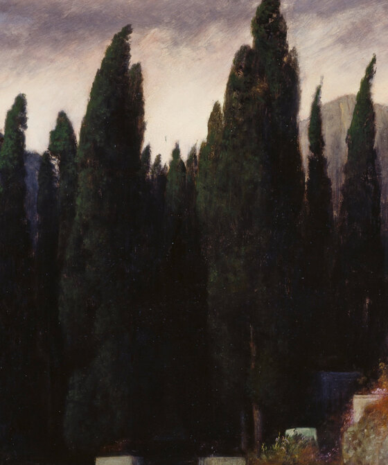 The dense black cypress grove at the centre of the island rising between the rock walls