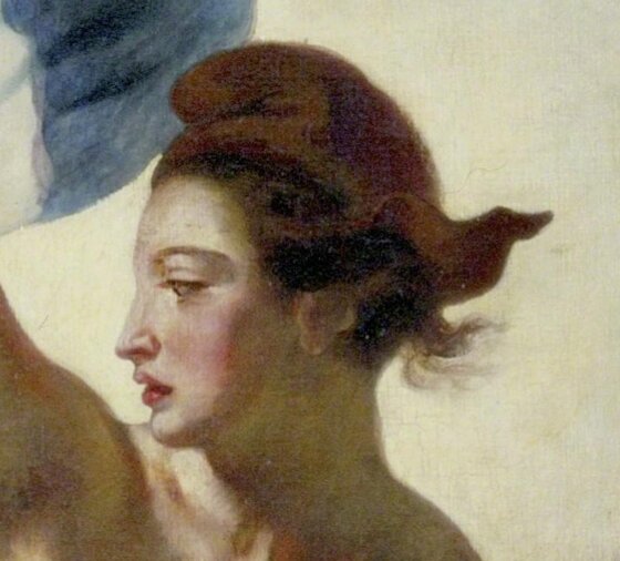 Liberty's face in profile under the red Phrygian cap