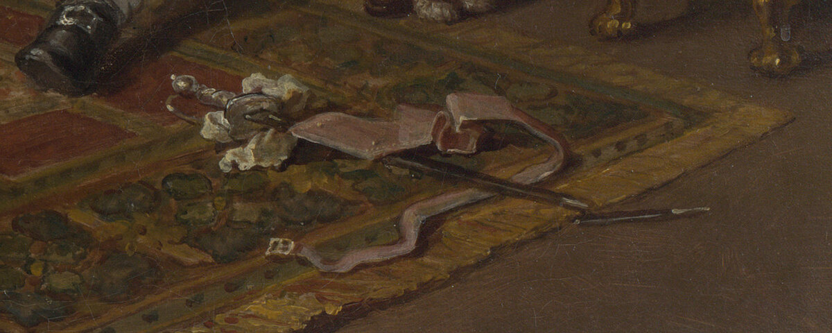 A broken sword lying on the carpet next to the Viscount's chair