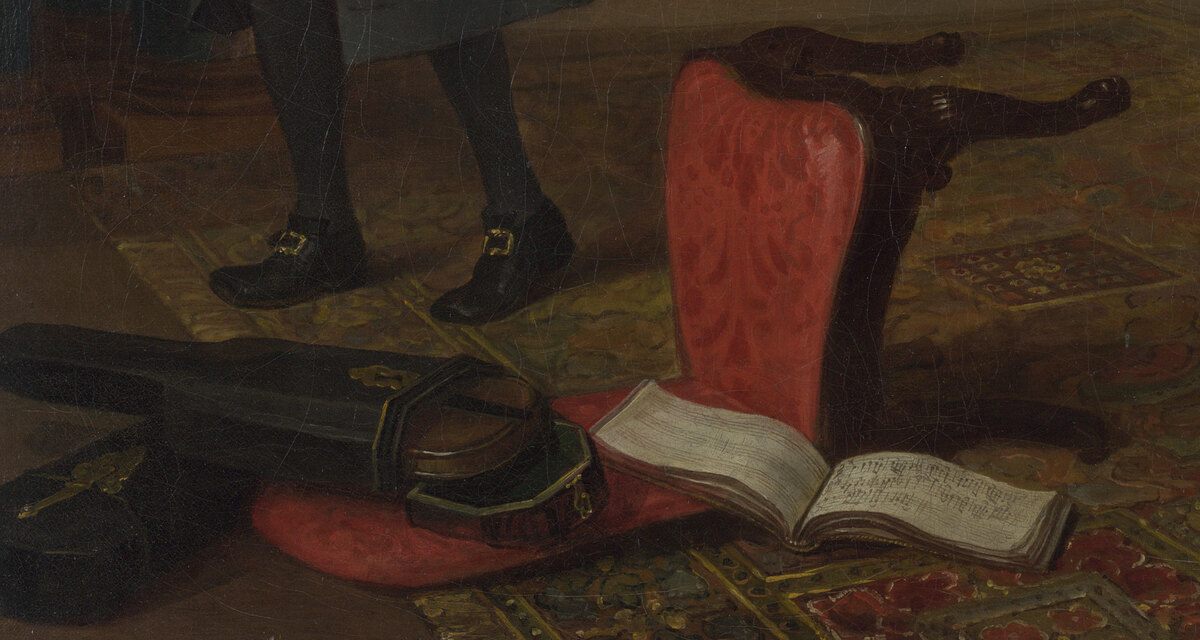 An overturned red chair on the carpet with a violin case and an open music book beside it