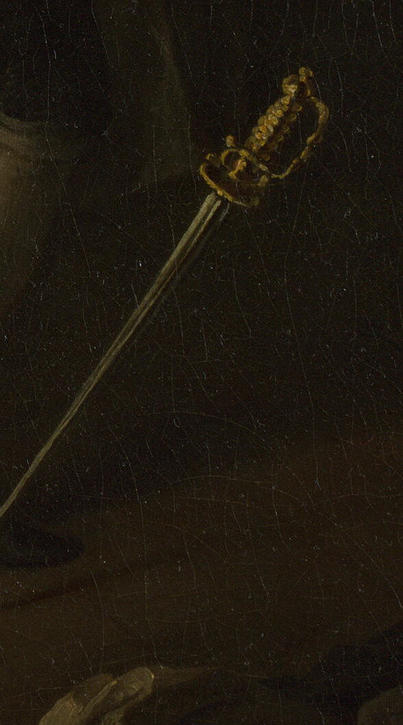 The Earl's dropped sword on the floor, its hilt catching the candlelight