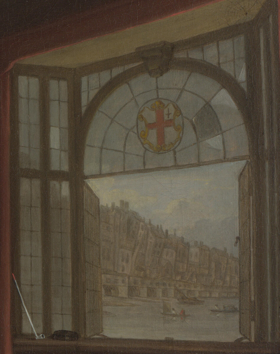 A view through an open window of old London Bridge lined with houses, a coat of arms in the stained glass above