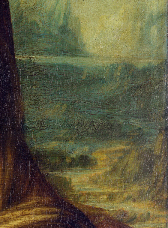 The landscape to the right of the Mona Lisa's head, with a stone bridge over a river and mountains dissolving into blue