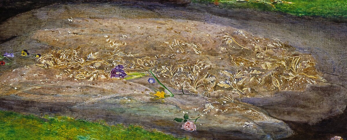 Ophelia's embroidered silver dress spread out on the water, flowers resting on it