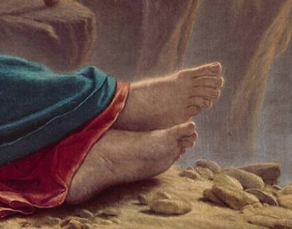 Christ's bare feet on the stony desert ground