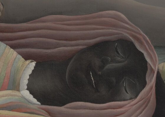 The sleeping woman's dark face in profile, eyes closed, lips slightly parted, on a striped pillow