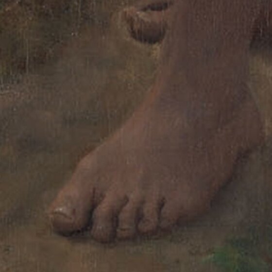 The girl's bare feet on the stubble field