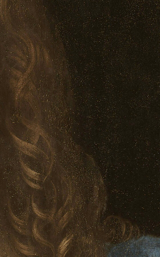 The ringlets of hair falling over Christ's shoulder, painted in fine spirals