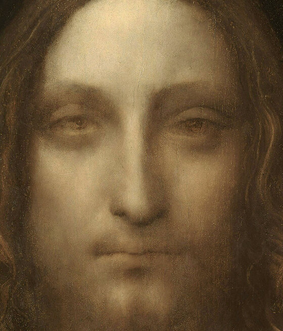 The face of Christ in the Salvator Mundi, frontal, soft-edged, eyes level with the viewer