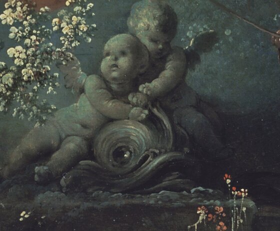 Two stone putti riding a dolphin at the foot of the tree beneath the swing