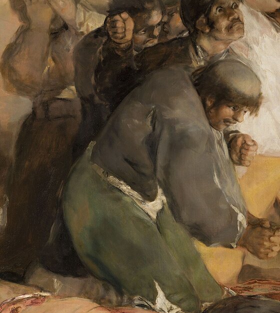 The friar kneeling with clasped hands beside the man in white, and behind him a man biting his fist