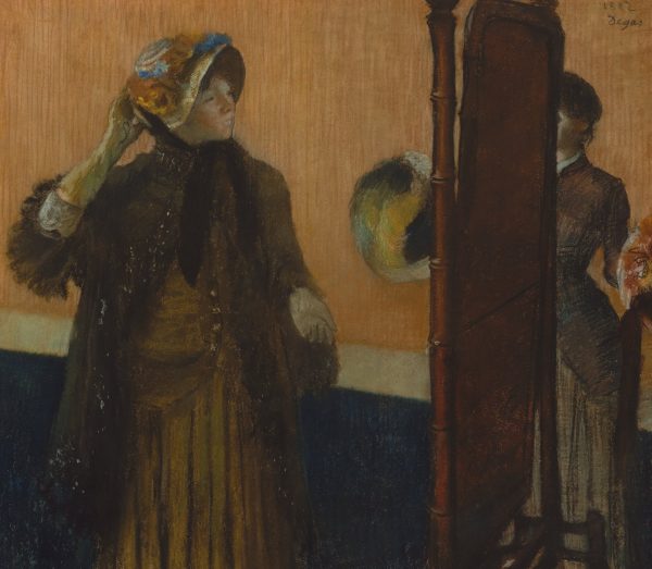 At the Milliner's by Edgar Degas