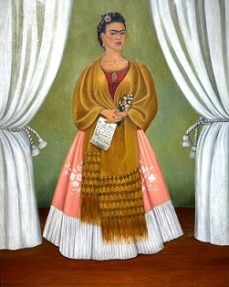 Frida Kahlo, Self-Portrait Dedicated to Leon Trotsky, 1937: Frida standing between white curtains holding flowers and a letter