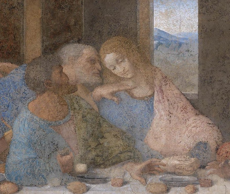 Judas in shadow clutching a money bag, Peter leaning forward with a knife behind him, and John leaning away with his eyes closed
