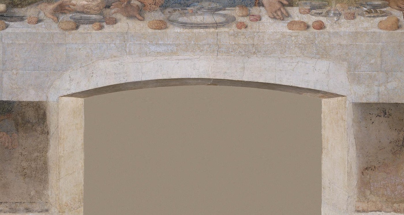 The bottom centre of The Last Supper, where an arched doorway was cut through the painted table and the feet of Christ