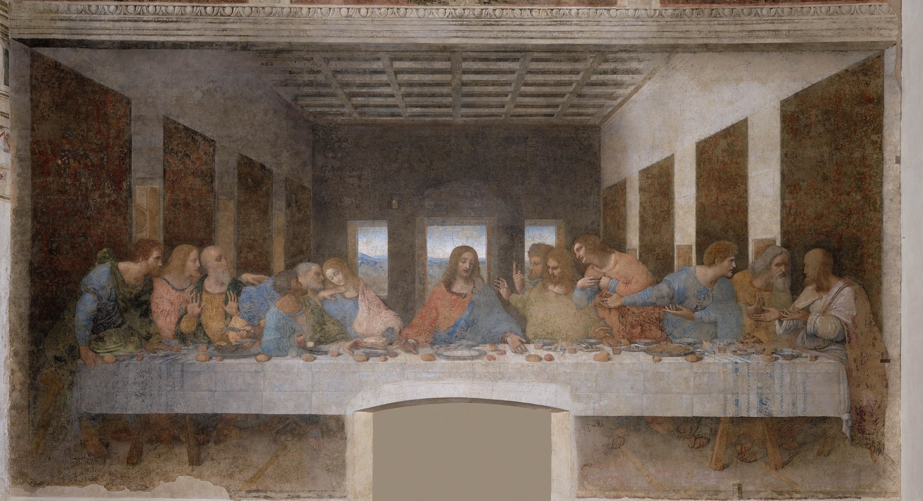 The Last Supper by Leonardo da Vinci as it is today on the wall in Milan, faded, with a blocked doorway cut through the bottom centre