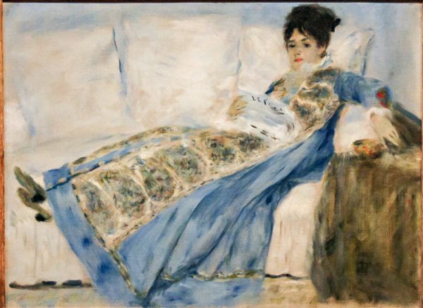 Madame Monet Reading Le Figaro by Pierre Auguste Renoir