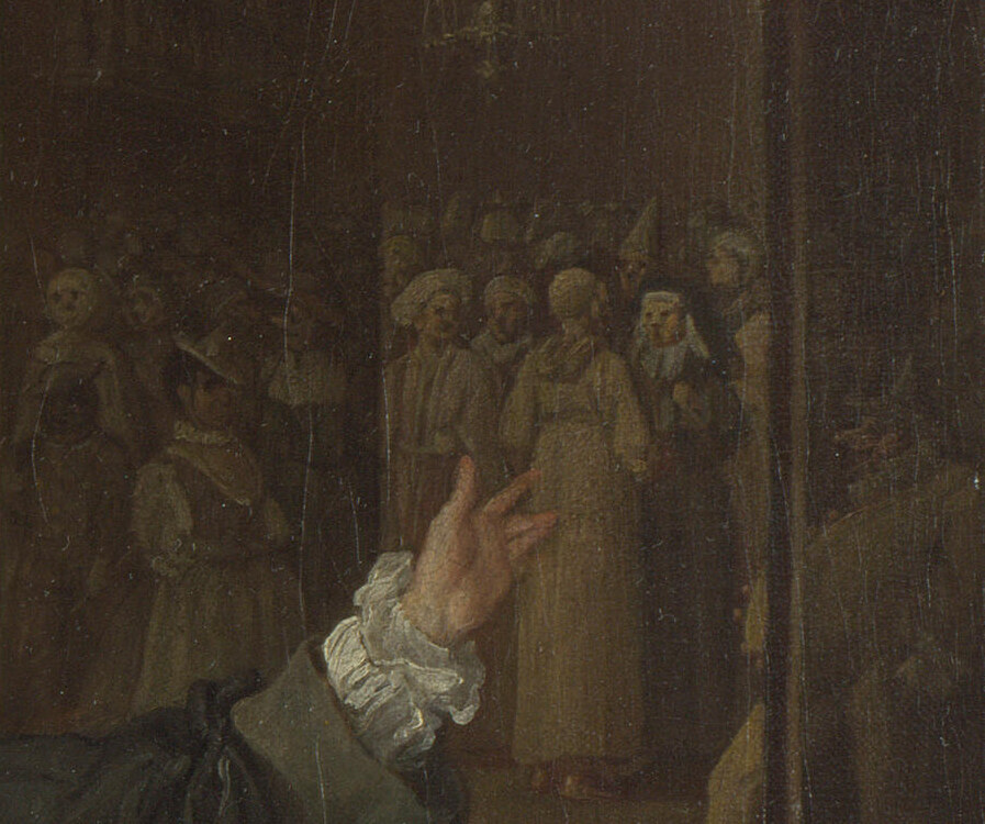 Silvertongue's hand pointing at a painted screen showing masked figures