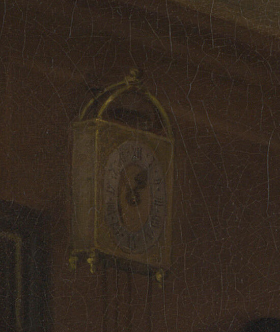 A plain brass clock on the wall of the father's house
