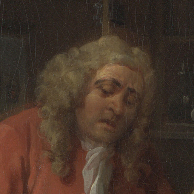 The Alderman in a red coat with his eyes lowered