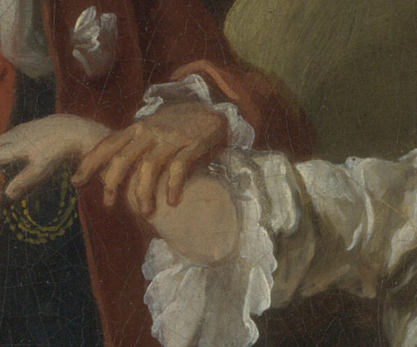 The father's fingers taking the ring from his daughter's hand