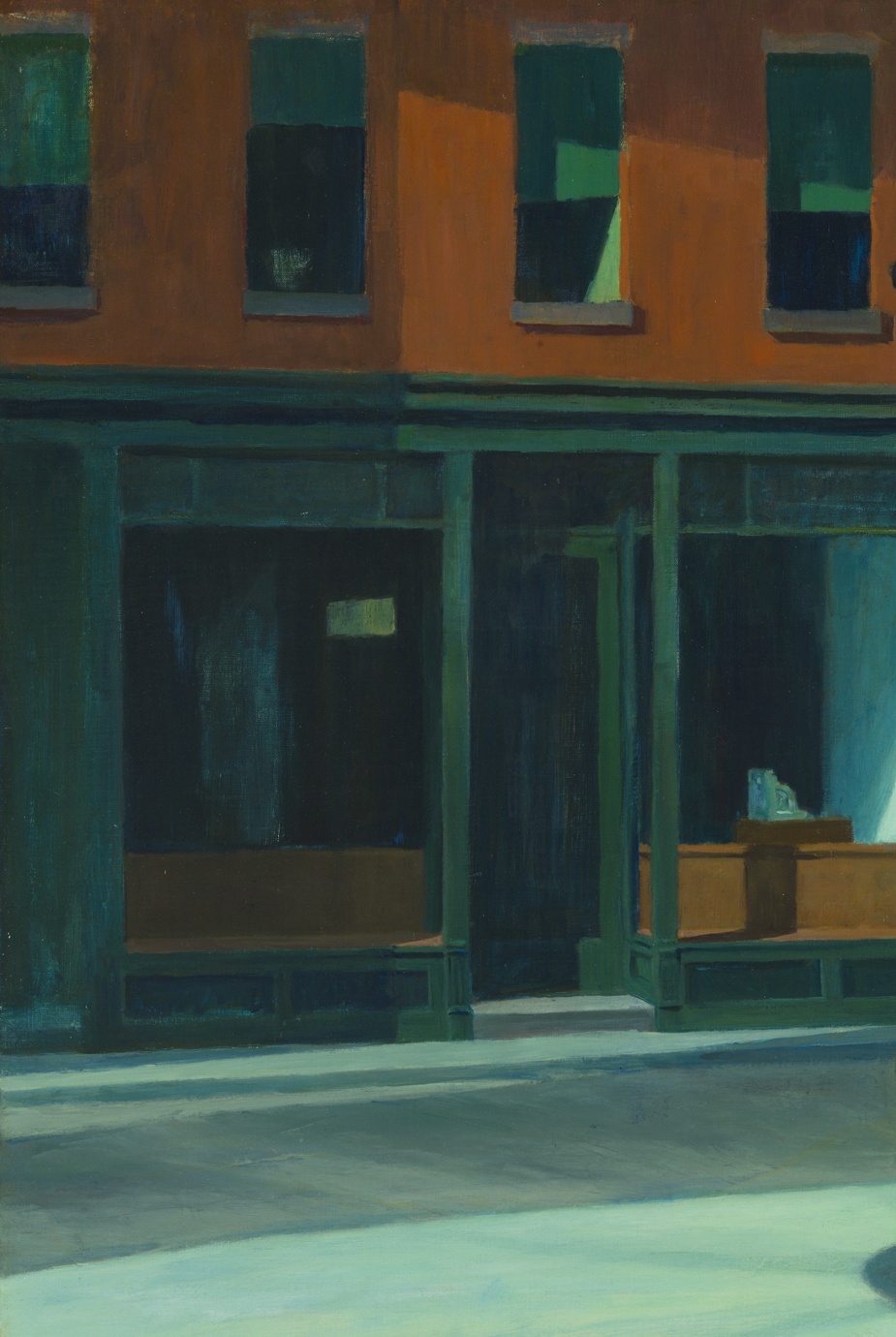 The empty storefront across the street in Edward Hopper’s Nighthawks