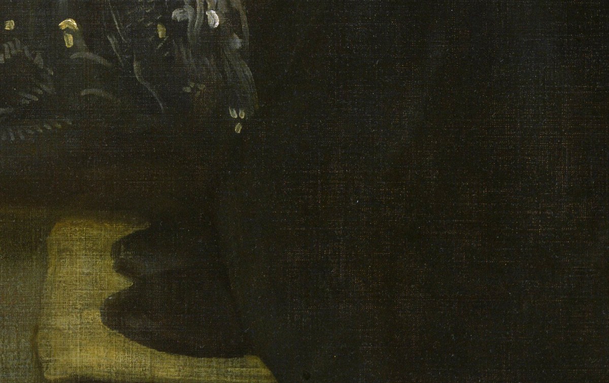 Anna Whistler's black shoes resting on a low yellow footstool at the bottom of the curtain