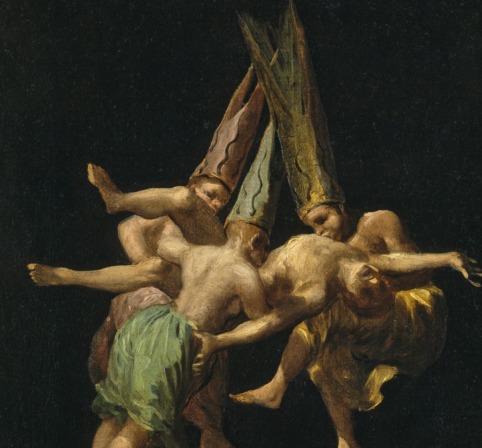 Detail of three airborne figures in pointed caps holding a nude man in Goya's Witches' Flight
