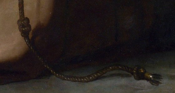 The knotted cord of the Franciscan habit lying on the floor