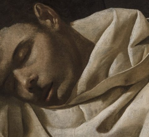 The face of Saint Serapion, eyes closed, head fallen onto his shoulder against the white habit